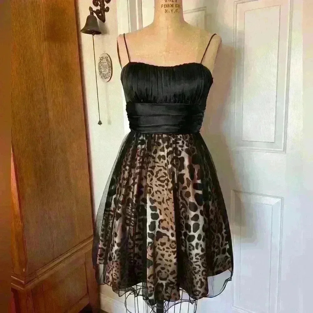 Blondie Nights, Fun Leopard Print, and Black Cocktail Dress. Size 1